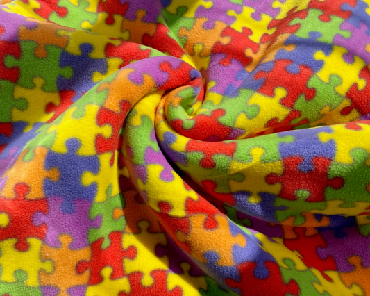 Dog onesie.  Fleece suit.  Bright jigsaw